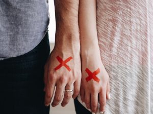 Norcross Spousal Support & Alimony Canva Two Hands with Mark X 300x225