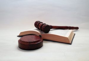 Gwinnett County Domestic Violence Defense Attorney Canva Justice Law Hammer 300x205